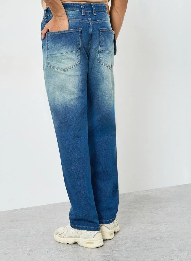 Styli  Men Blue Loose Fit Faded Jeans for Men | Best Price UAE